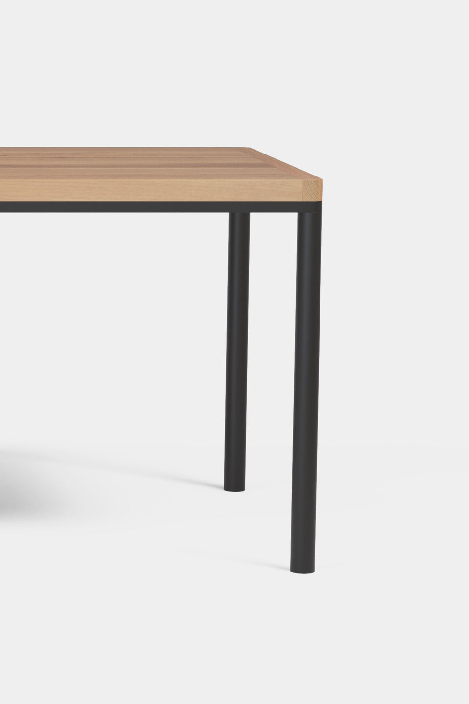 Steel legs meet solid wood for a clean, refined look.